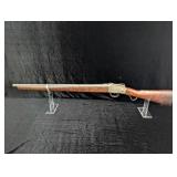 Possibly a Remington or Springfield Rolling Block