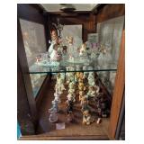 Figurines in and on Cabinet