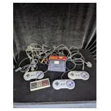 (3) SNES Controllers (1) NES Controller; Game