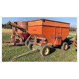 ORANGE GRAVITY WAGON WITH JOHN DEERE GEAR
