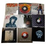 23 Vintage 45 RPM Vinyl Records Featuring Various