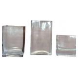 Three Clear Glass Vases in Various Geometric Shape