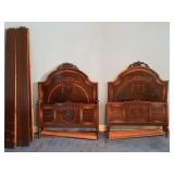 Pair of antique twin beds.