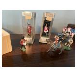 Toy soldiers. All the ones in the cigar box are