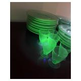 19 vaseline glass salad plates and six cordial