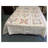 Two handmade quilts. Both have some stains as