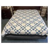 Quilt shown on a full size bed, we saw a slight