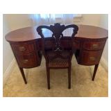 Antique kidney shaped desk and chair.  This is