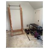 Weight bench, weights, and homemade chin up bar.