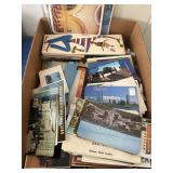 Vintage postcards and souvenir brochures and