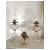 Three kerosene lamps