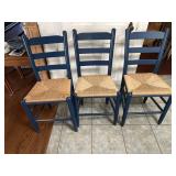 Three sturdy ladder back chairs
