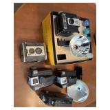 Old Kodak cameras, including brownie Hawkeye and