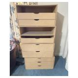 Particleboard stacking drawers. There are four