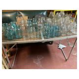 Old canning jars, including Presto widemouth,