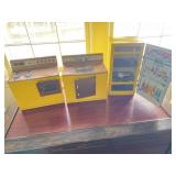 Vintage metal play kitchen. The oven door is