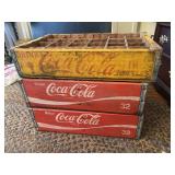 Three vintage Coke crates