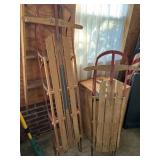 Two vintage sleds one is Sears and it has