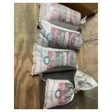 3 25 pound bags of magnum shot, a partial bag and