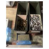 Two ammo boxes and ammo. It is assumed these are