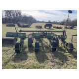 Vintage John Deere four row corn planter. Notice