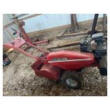 Huskee rear tine tiller. We did not get this