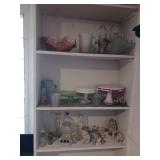 Three shelves of miscellaneous glassware three