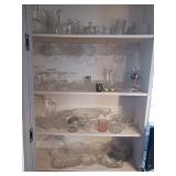 Four shelves of miscellaneous glassware