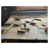 Antique hand drills and auger bits