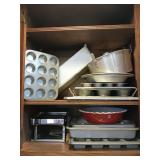 Assorted baking pans and a pasta maker