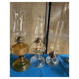 Three kerosene lamps