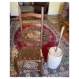 Old rocking chair and butter churn. Butter churn