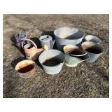 Old wash tub, coal bucket, and other buckets as