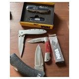 Two NRA, knives, Kershaw, knife, and DBT