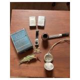 Vintage Falcon tobacco pipe, two zippo lighters,