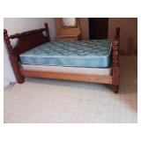 Full size bed very solid very heavy is upstairs