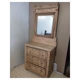 Antique dresser with a mirror probably