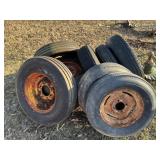 Nine old tires and rims
