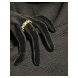 Ladies 14 KT 4 diamond fashion band. Diamonds are