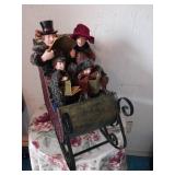 Christmas decoration sleigh with carolers and