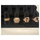 4 menï¿½s rings. Left to rightï¿½.solid gold size 8,