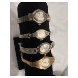 4 vintage ladies watches left to right. Times