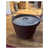 Cast iron bean pot. No number on the bottom.