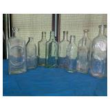 Vintage glass bottles, including Scottï¿½s
