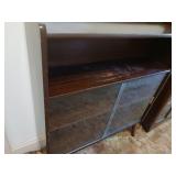 Vintage bookshelf with bottom glass sliding