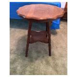 Tiger oak antique parlor table with scalloped