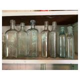 Vintage medicine bottles, including KONJOLA