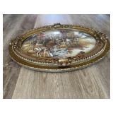 Fabric wall art with antique bubble glass frame.