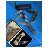 Five pocket knives. Including two NRA and one