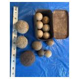 Indian artifacts Assorted game balls, and one